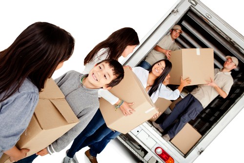 Removal team loading furniture for a Cambridgeheath home move