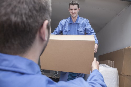 Removal team helping with a residential move in Cambridgeheath