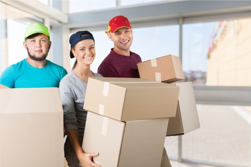 Removal team planning a local move in Cambridgeheath near residential buildings