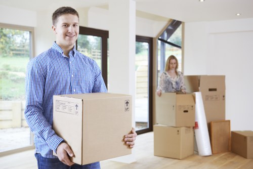 Packed boxes and furniture ready for a removals van in East London