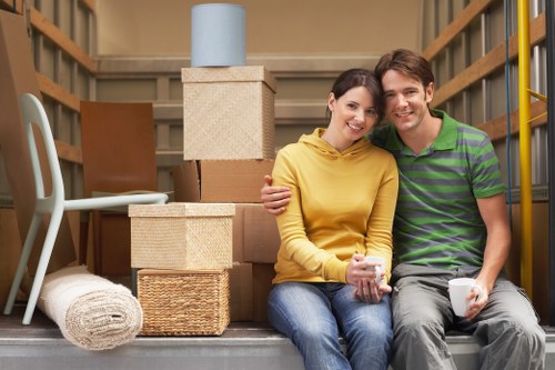 Furniture and boxes arranged to show cubic-yard volume for a move