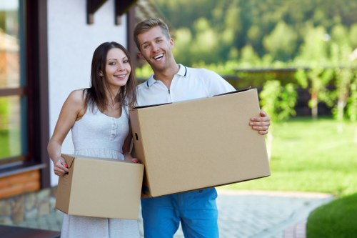 Professional movers handling furniture for a flat or house move