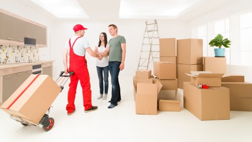 Packed boxes and furniture ready for a Cambridgeheath home relocation