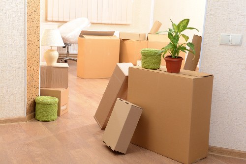 Trained removal staff handling furniture with care and attention